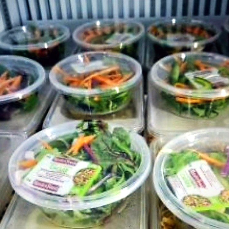 Packed garden salads ready for crib lunches